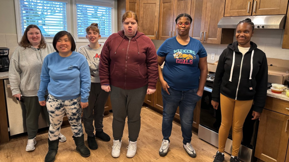 Eileen Williams, Erica Sang, Gabby Marcial, and Megan Schuster pose together for a photo