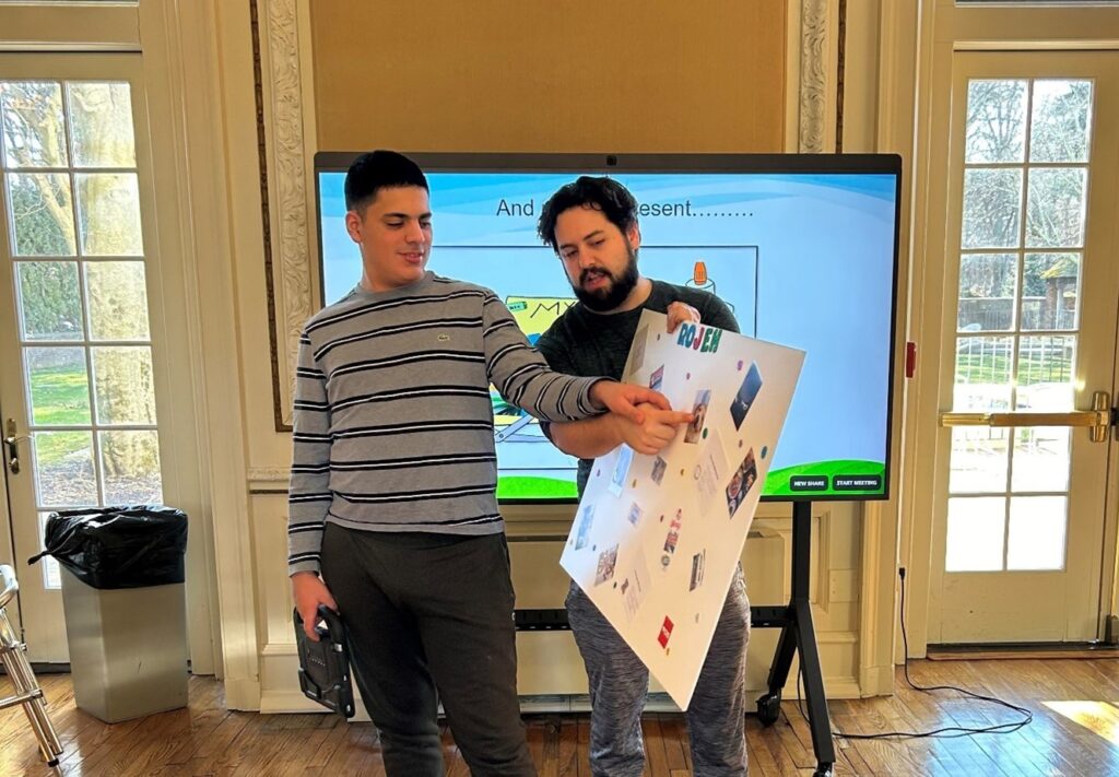 Students present the vision boards made in their Discovering You workshop