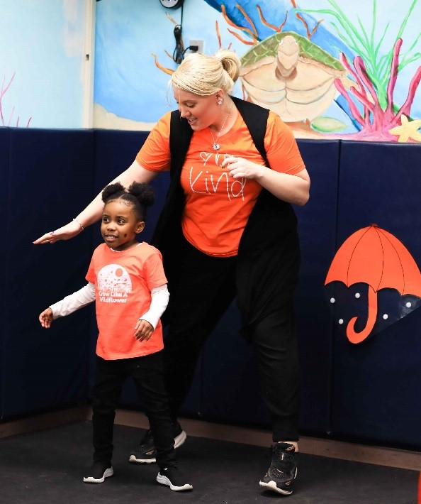 Marcus Avenue Student Skylar dances with Movement Therapist Danielle Wood