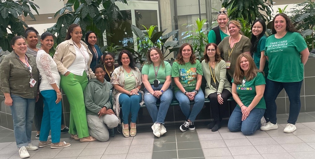 Marcus Avenue staff dressed in Green for Mental Health Awareness Month