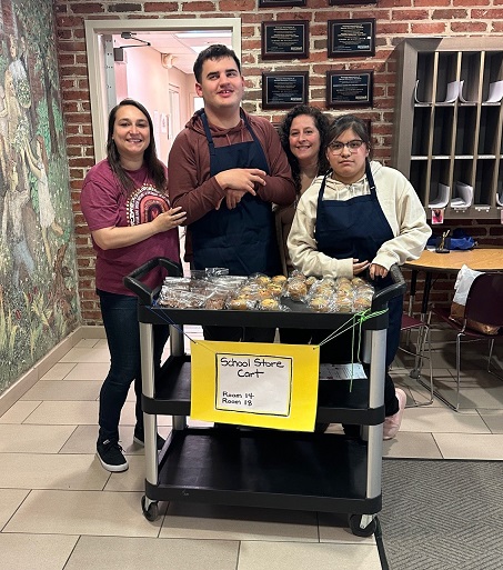 Children’s Education Center Students pose with their snack cart