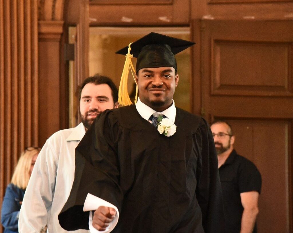 One of the BCCS graduates walks to get his diploma
