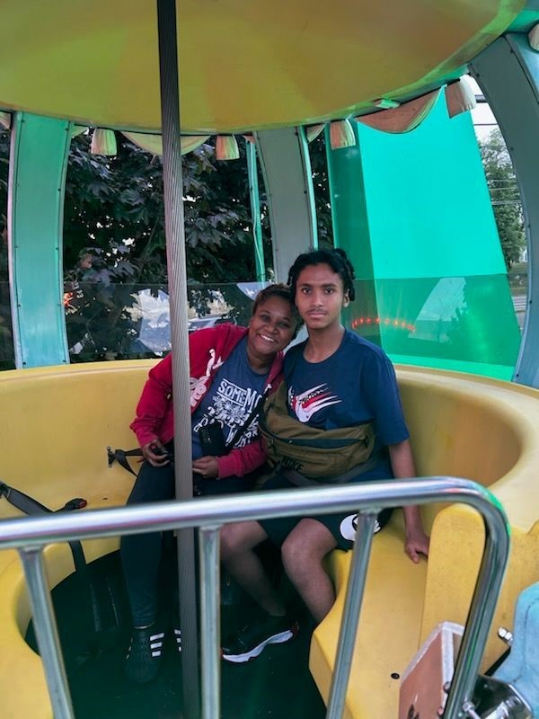 DSP Najoya Stewart with a resident from the CRP where she works