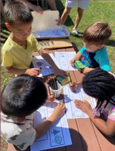 Post Avenue students coloring on one of their themed days.