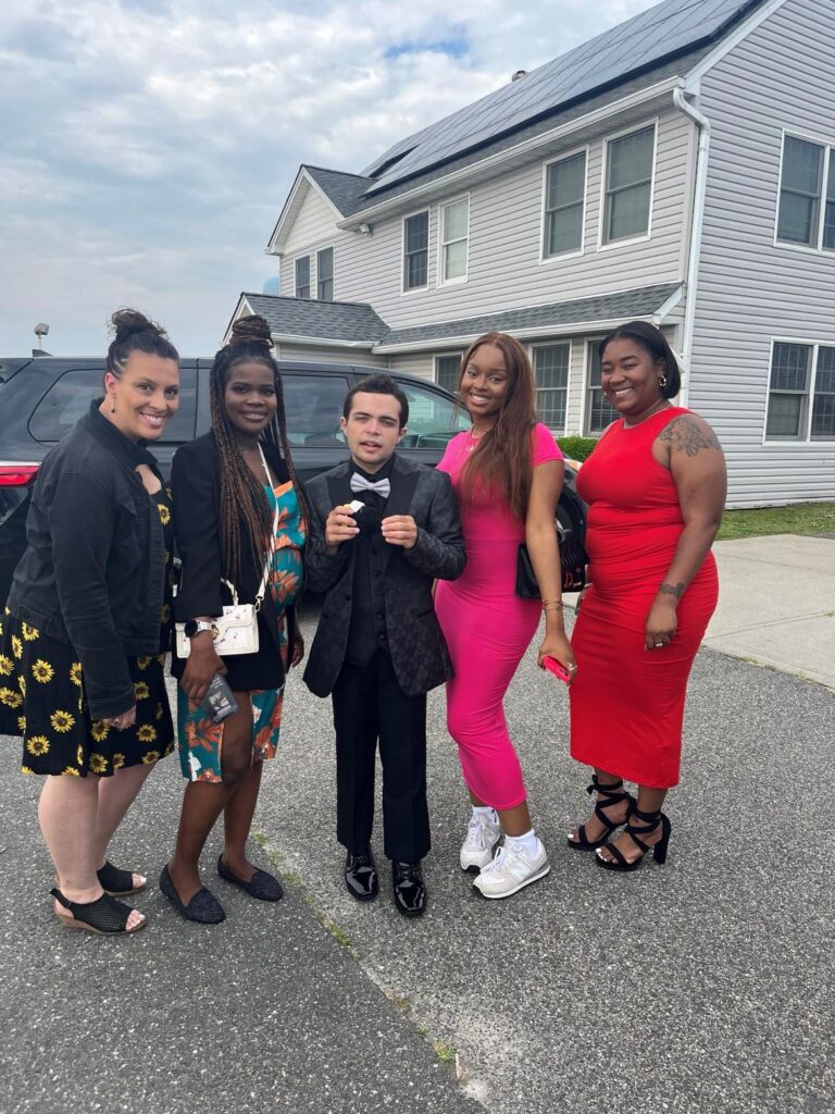 A CRP Resident poses with DSPs at prom