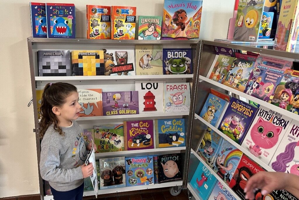 A BCCS student looks at books at the Scholastic Book Fair.