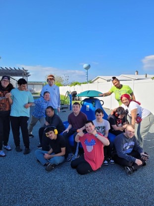 Kristine Jones at the beach with CRP residents and staff members.