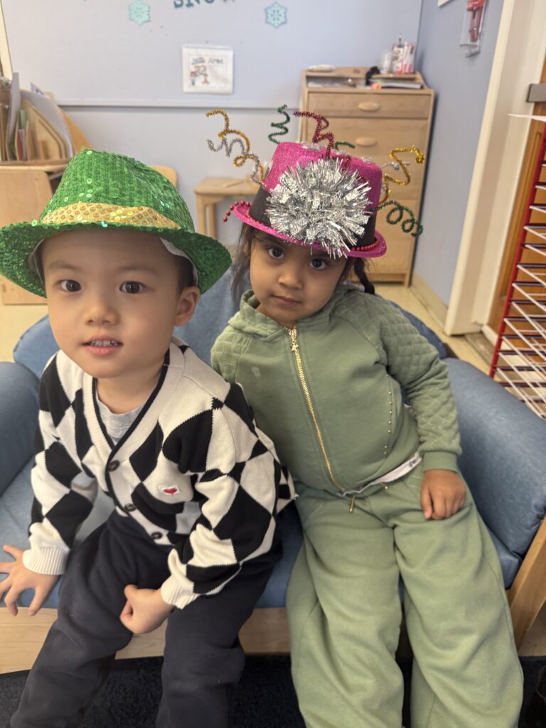 Two Post Avenue students wear festive hats for