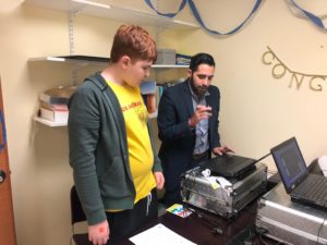 New York Life representative connects with BCCS student for Child ID Card.