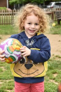 young child with soccer ball