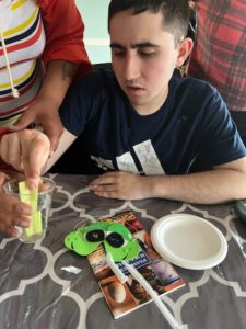 boy doing arts and crafts