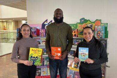 Rickey Rogers and two other Parents' Association members at the book fair.