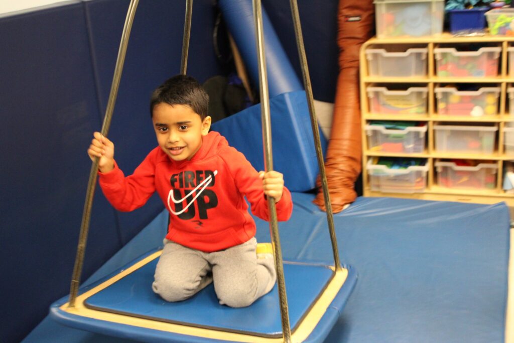 A student learns skills at Home- & Community-Based (HCBS) Program