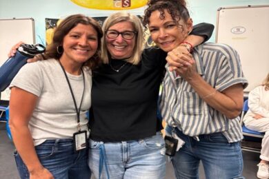 Marcus Avenue Preschool Teacher Sharon Levenson and her coworkers at her retirement party.