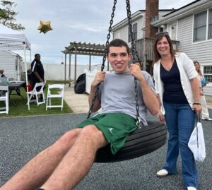 Elisa Berman pushes her son Max on the tire swing at the CRP