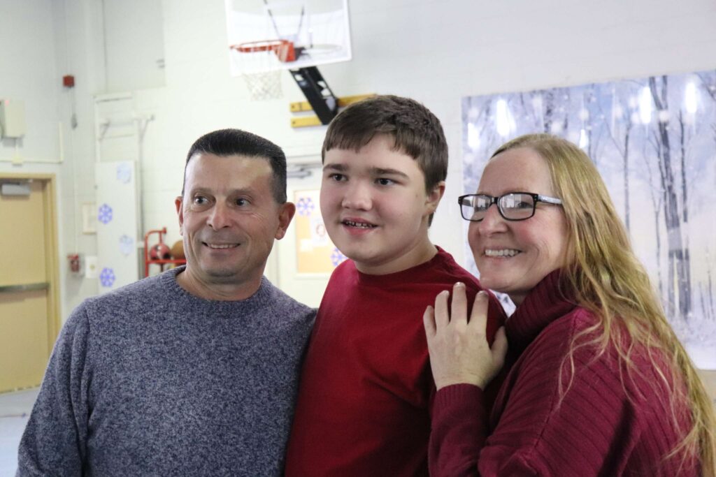 A BCCS student and his parents